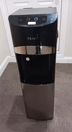 Hot and cold water dispenser; works well used