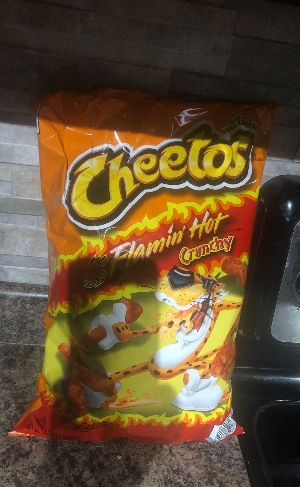 Giant 1 lb hot Cheeto bag