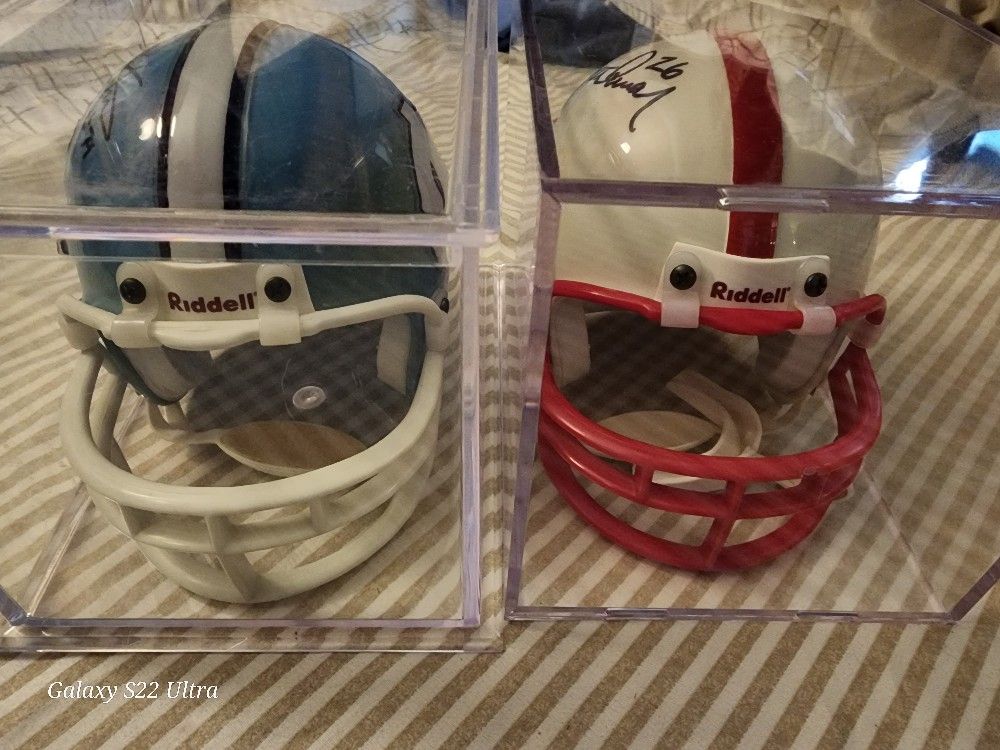 2 Mini Signed Helmets .... $235