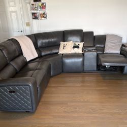 Two Year Old Sectional Leather With Recliners. 