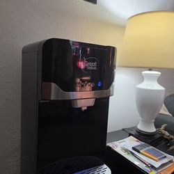 Great Value bottom-loading water dispenser. 
This appliance dispenses hot, cold, and room temperature water.