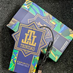 Trinidad Espiritu Wireless Speaker And Phone Charger 