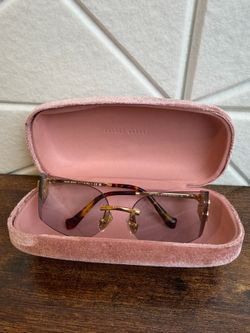 Miu Miu Rimless Logo Sunglasses Gold
