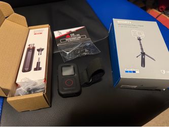 Go Pro Accessories; remote, 2 tripods and extender