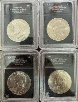 SET OF 4 - 1971, 1972, 1973, 1974 - AU BRILLIANT UNCIRCULATED EISENHOWER DOLLAR