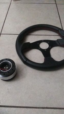 Universal steering wheel and quick release