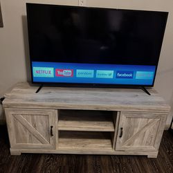 Entertainment Center and 60” Smart tv