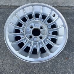 One 15 inch stock aluminum wheel from a foxbody mustang. 4x108mm
