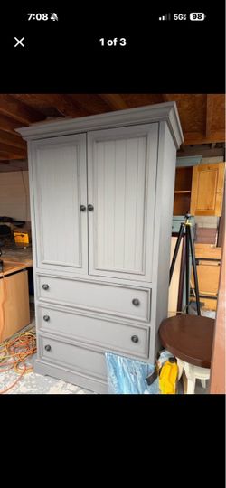 Grey wood armoire/tv