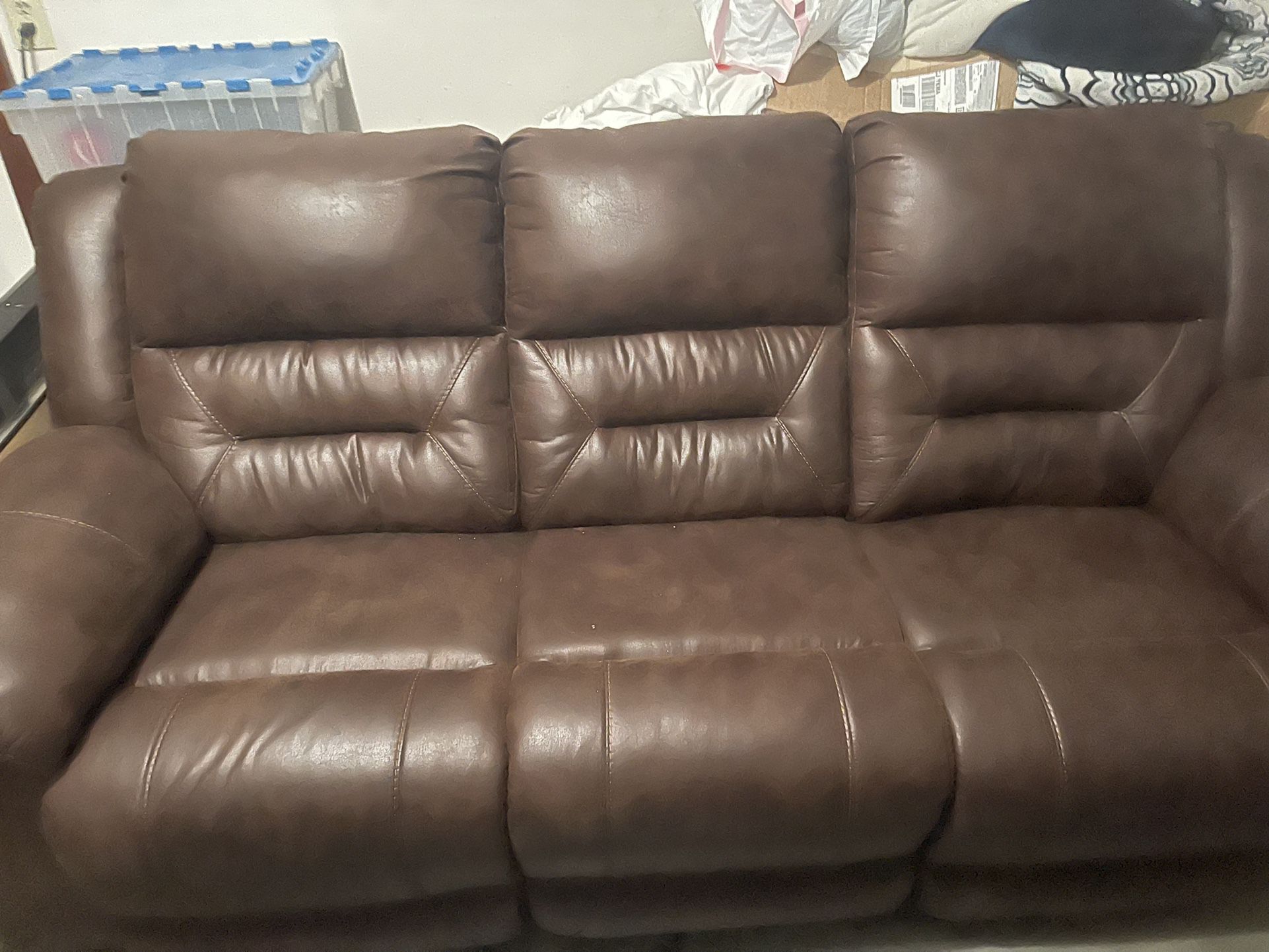 Brand New Couches that All Recline and Cup Holders 