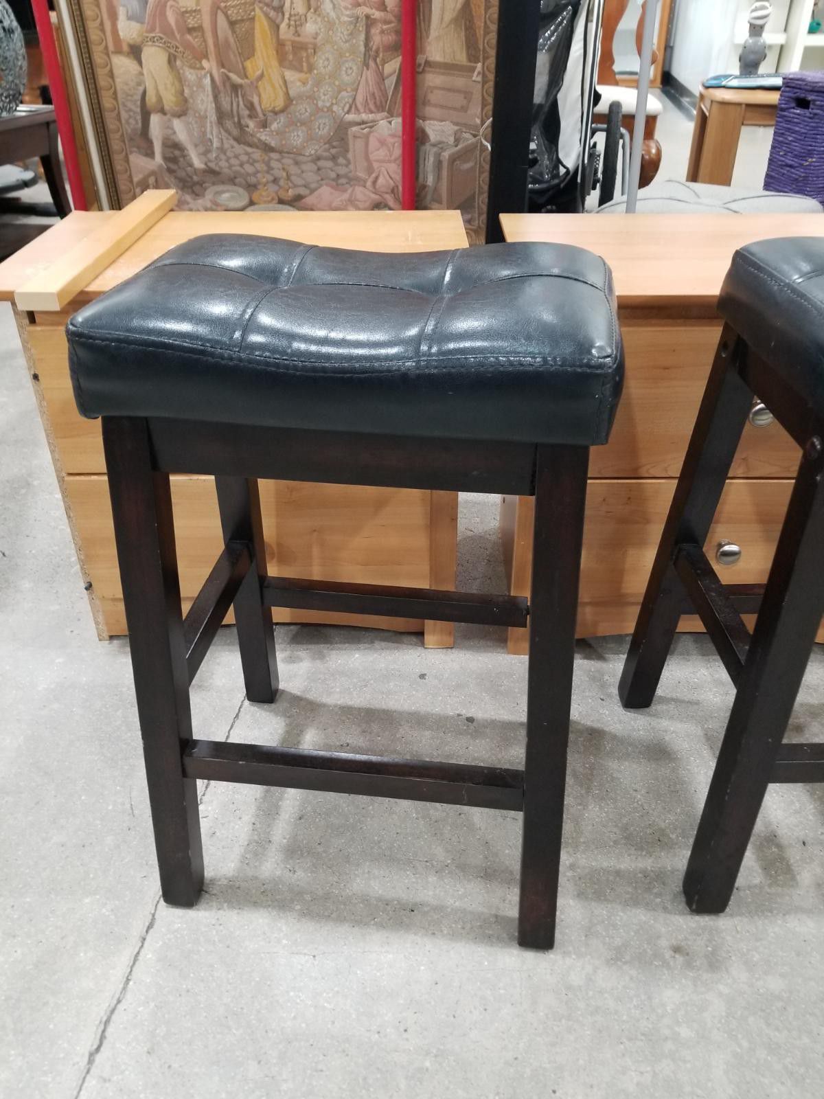 Two black/chocolate bar stool