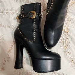 Vers*ce- Woman’s Heel Boot.- black 