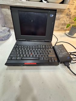 Vintage IBM Thinkpad computer for parts with original charger