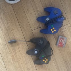 2 Nintendo controllers and memory card