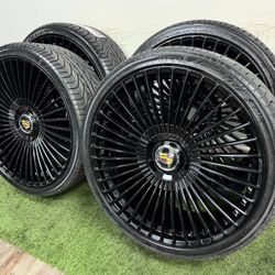 New 26 inch gloss black wheels with cadillac floating caps and Lexani  305/30r26 tires