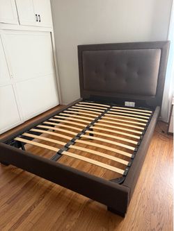 Queen Sized Upholstered Panel Bed