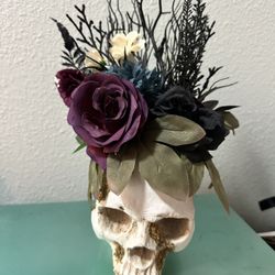 Faux Flower Arrangement In Skull