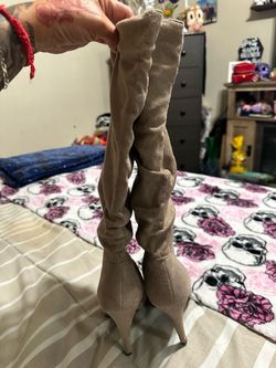 Long tan stiletto boot