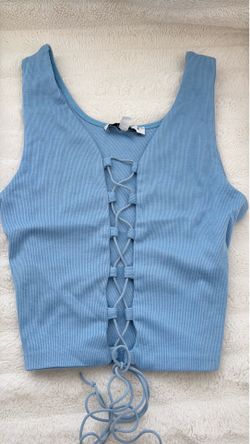 💙 Top azul con detalle de cordones al frente