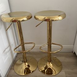 Brage Living adjustable retro bar stool in a gold finish.