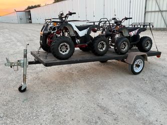 Trailer and 2 TAO 150cc 4 wheelers