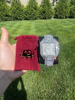 This is a very nice VVS iced out Cartier watch