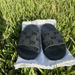 GUCCI Men's rubber GG slide sandal Black , Size - 7 .US