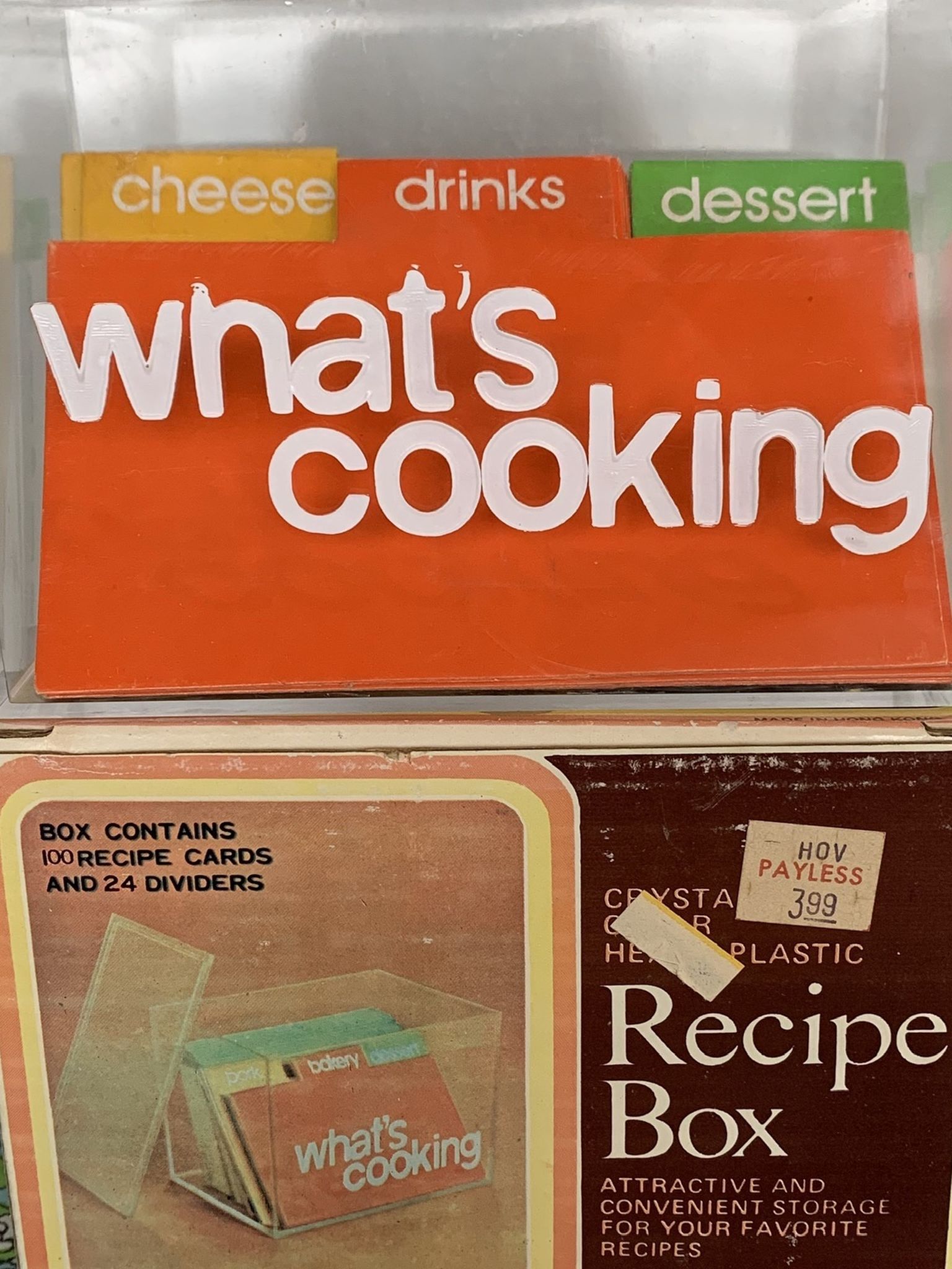 Vintage 70s acrylic recipe box with blank cards and dividers. In original box. Unused. “What’s cooking” graphic on the front is in white