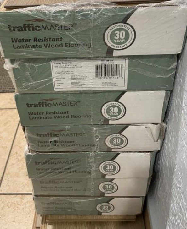 670 Sq Ft - Traffic Master 8mm Water Resistant Laminate Flooring