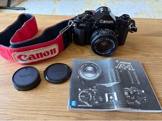 Canon A-1 35mm Film Camera – Working – FD 50mm f/1.8 Lens, Manual & Original Strap