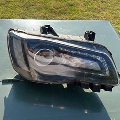2017-23 CHRYSLER 300 headlight  OEM Right side USED