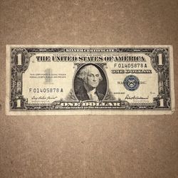 Vintage 1957 silver certificate 1 dollar bill with low serial number
