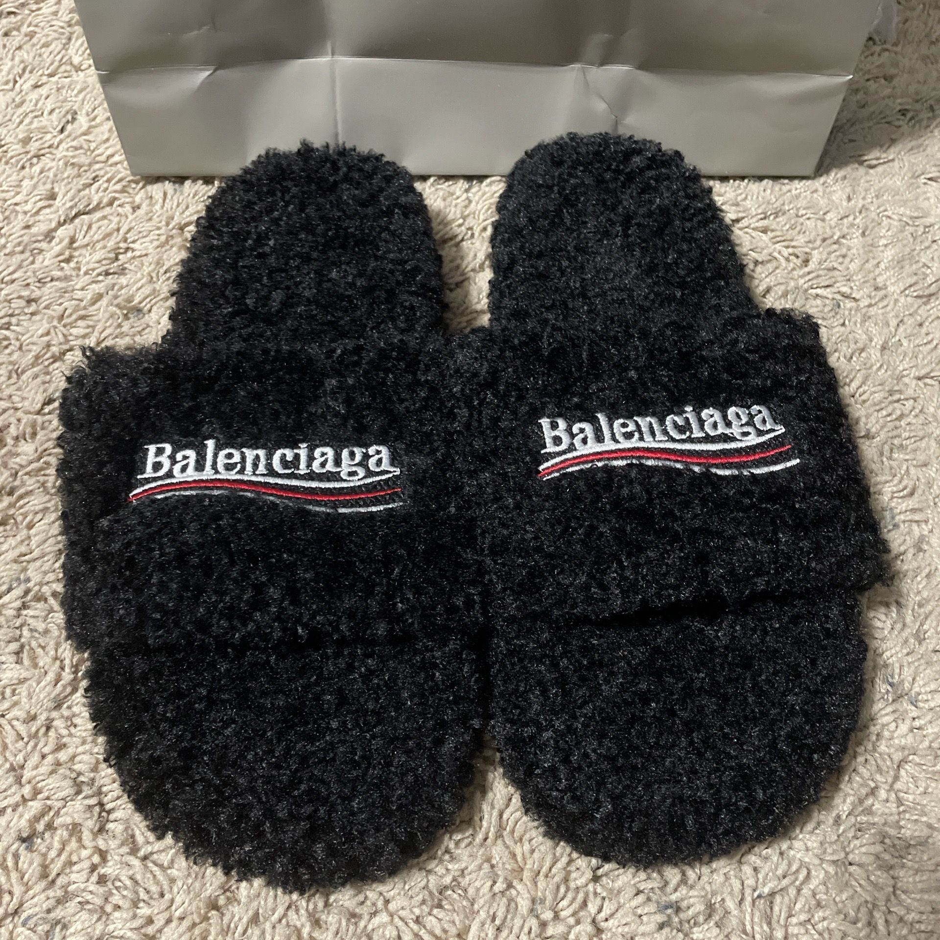 Bálenciaga black fur slides