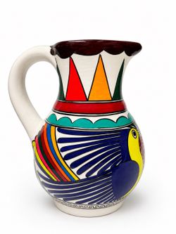 Large ceramic pitcher with a glossy hand-painted