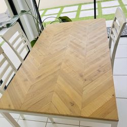 West Elm Dining Table Natural colored reclaimed wood and white creamy base