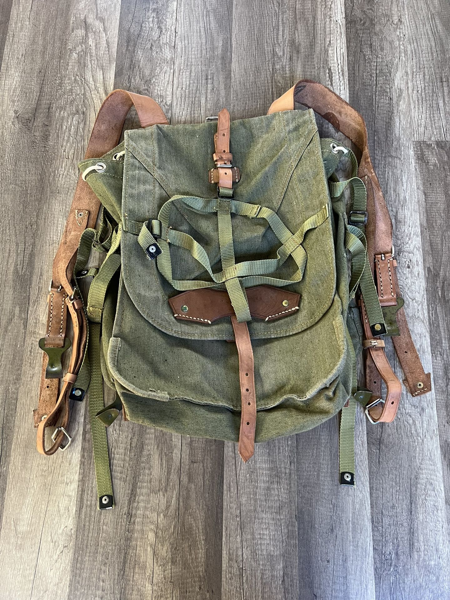 Russian military green canvas backpack from the 60s with straps and buckles