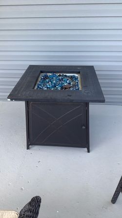 Propane fire table with blue stones