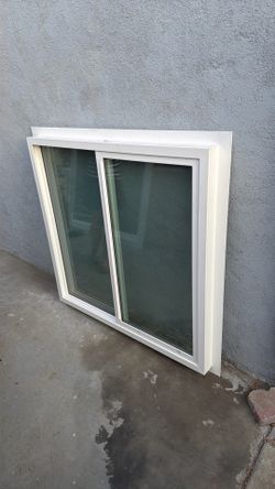Brand New White Vinyl Sliding Window 45.5” x 44” with Screen