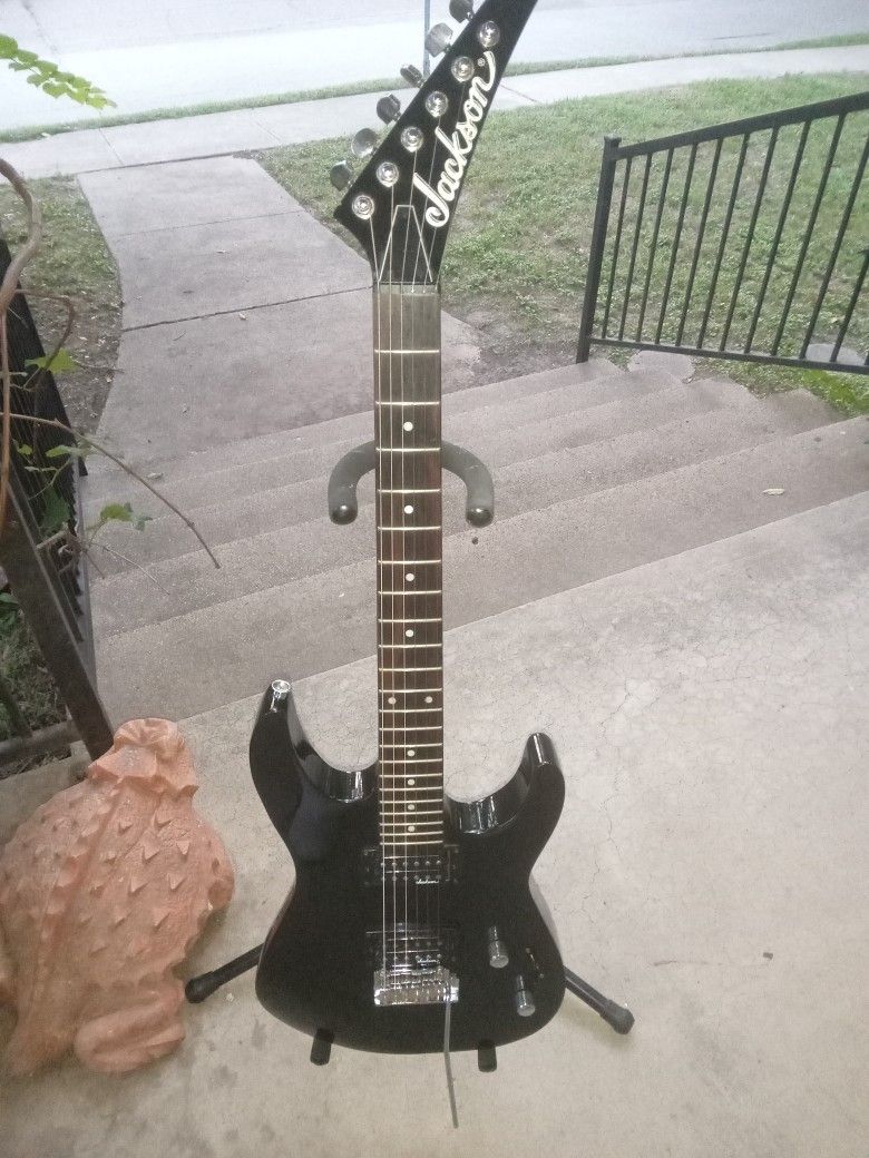 Jackson JS1 Electric Guitar With Roadrunner padded Gig Bag And Accessories 