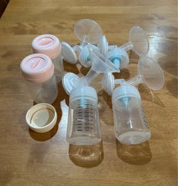 Used baby bottles and pump parts