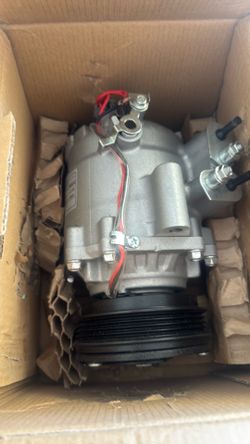 Brand new AC compressor for a Honda