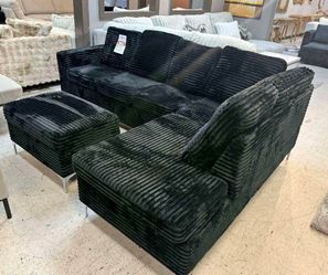 Brand new black sectional with Ottoman
