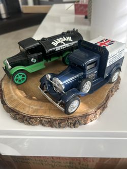 This Are Limited Editions 1:25 Scale Die Cast 1931s Bank Coin Trucks.