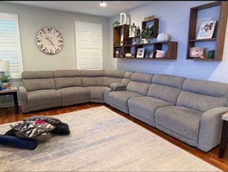 Large Gray Fabric Reclining Sectional Sofa from Ashley Furniture