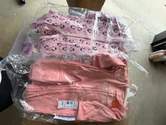 Box of baby PJs