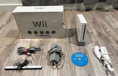 Official Nintendo Wii console w/ original packaging - (Tested & Working)