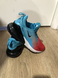 Nike Air Max 270 sneaker featuring a red, blue, and black colorway