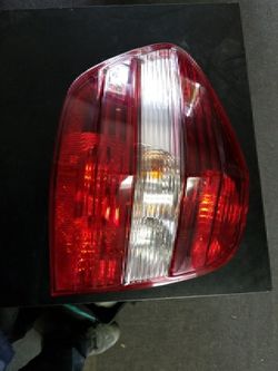 2011 ML350 left tail light OEM
