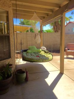 Hanging swingy bed, custom made. Perfect for under a porch or tree.
