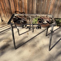 dual-burner outdoor propane cook stove / camp cooker.